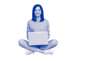 Woman sitting with her laptop in her lap. 